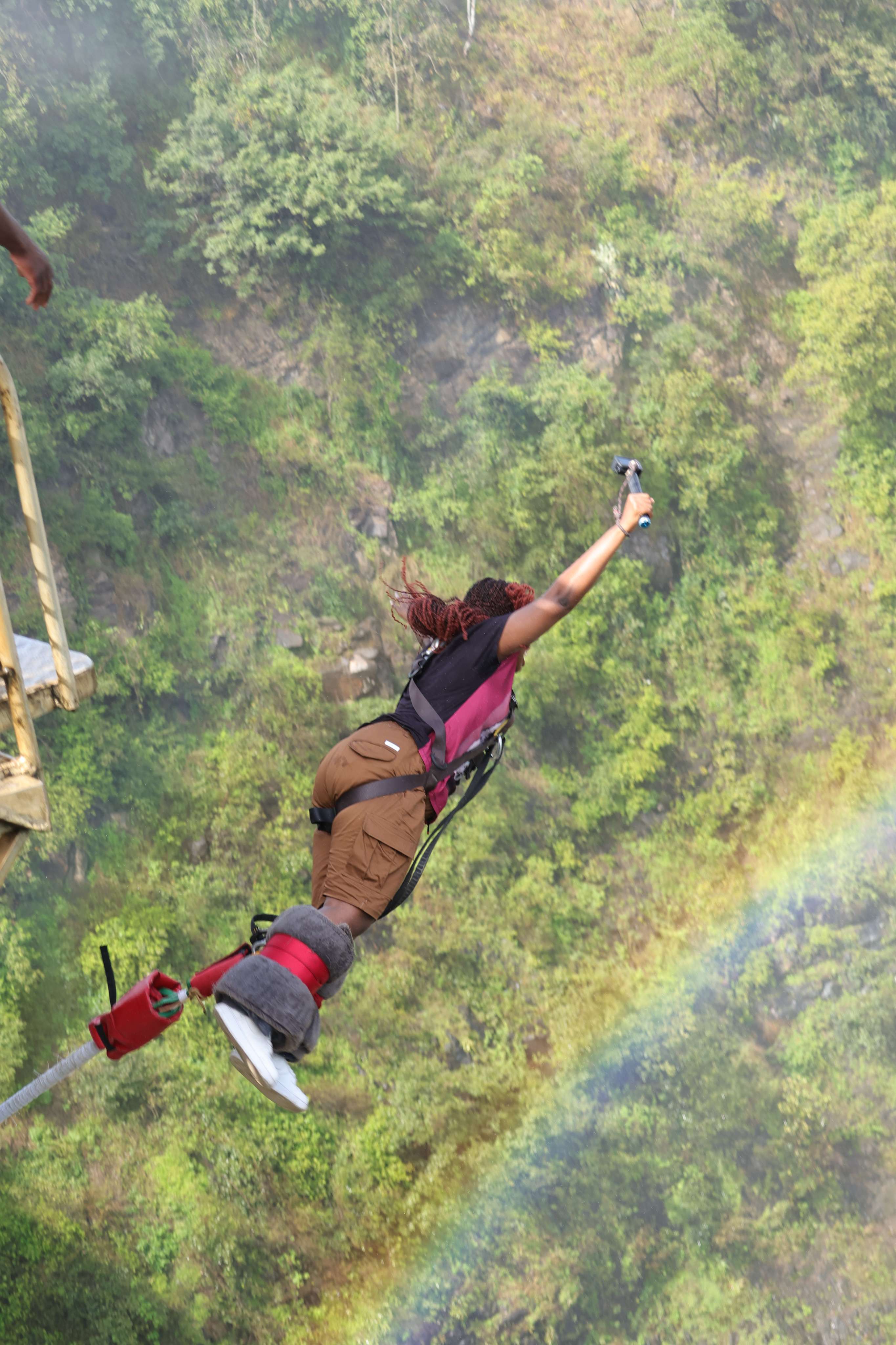 Bungee jumper in mid-air Victoria Falls